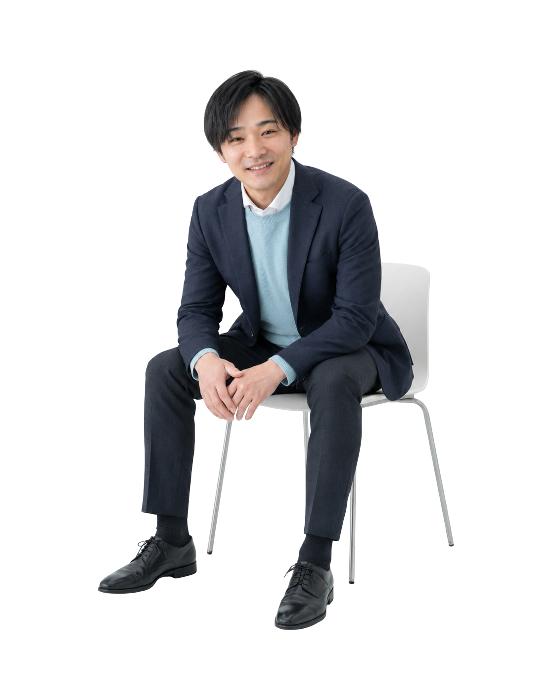 椅子に座って話を聞くterasumuスタッフ 河野一輝